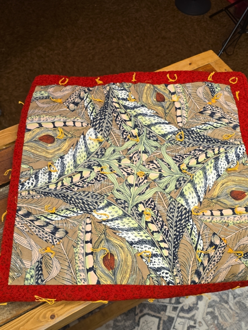 Feather Print Decorative Lap Quilt with Red Border